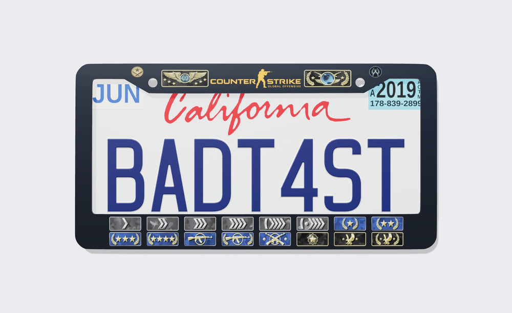 Navy Counter-Strike Global Offensive ranks license plate frame with the CS:GO logo between rank badges on top and all eighteen competitive rank badges along the bottom, front view