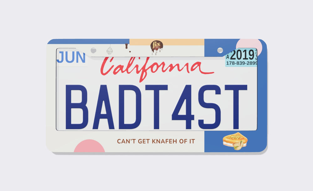 Dubai Chocolate license plate frame, front view: cream, blue and peach color blocks with pink circles, a dripping chocolate badge on top, a pistachio knafeh chocolate bar in the corner and the line Can't Get Knafeh Of It