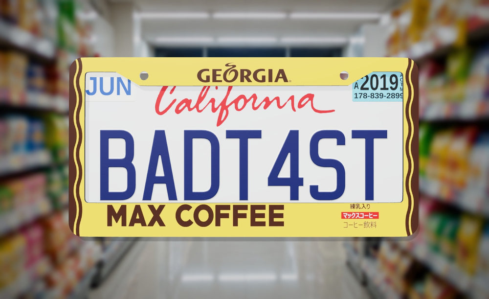 Georgia Max Coffee license plate frame on a themed background