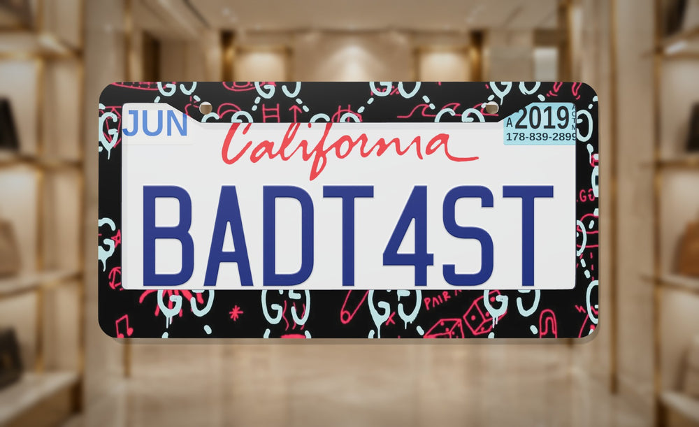 GC Rainbow Luxury Style Pattern license plate frame on a themed background
