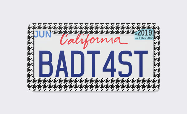 Black and white classic houndstooth pattern license plate frame, front view