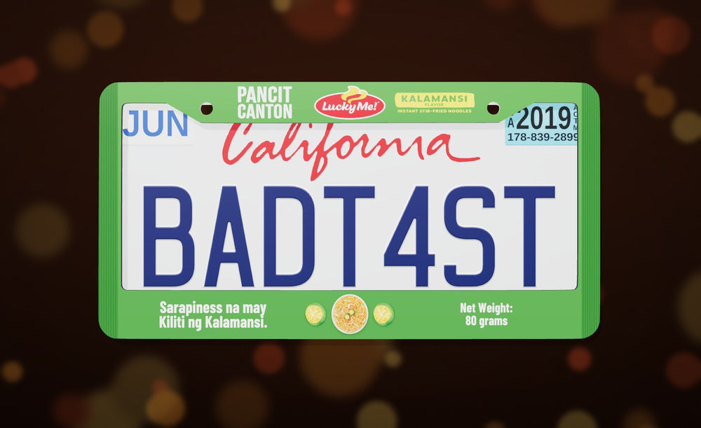 Lucky Me Pancit Canton license plate frame in green with the Lucky Me logo and Kalamansi flavor, front view on a dark night-market bokeh background