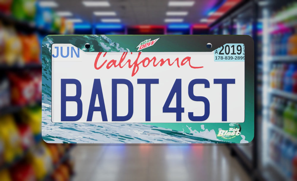 Mountain Dew Baja Blast license plate frame on a themed background