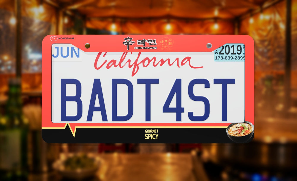 Shin Ramyun Noodles license plate frame on a themed background