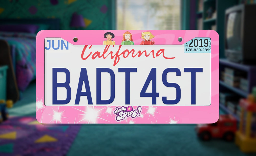 Totally Spies license plate frame on a themed background