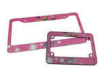 Two pink license plate frames with cartoon characters on a white background