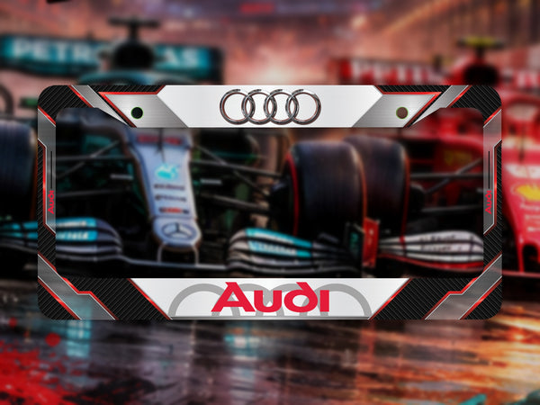 Silver, carbon and red Audi F1 Team 2026 license plate frame in front of F1 cars on a wet track