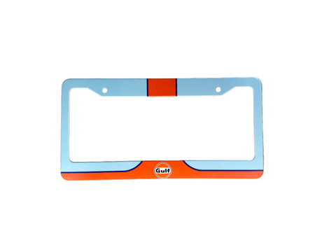 Blue and orange license plate frame on a gray surface