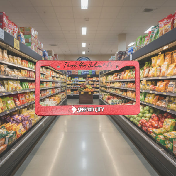 Red Seafood City Supermarket license plate frame with Thank You Salamat Po text in a grocery aisle
