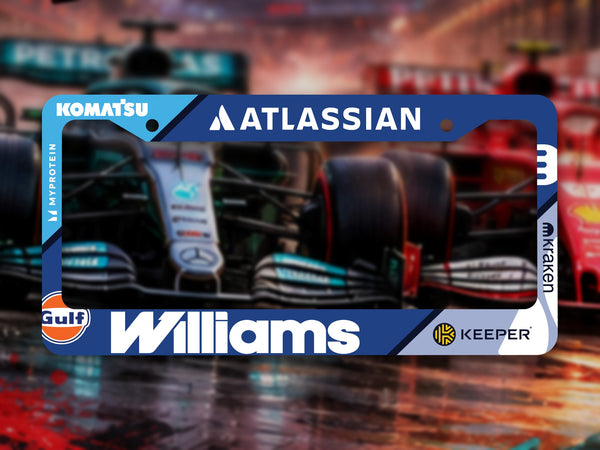 Blue Atlassian Williams Racing F1 license plate frame in front of F1 cars on a wet track