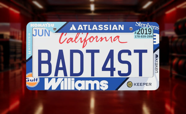 Atlassian Williams Racing F1 license plate frame on a themed background
