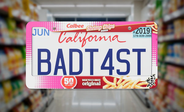 Calbee Shrimp Chips license plate frame on a themed background