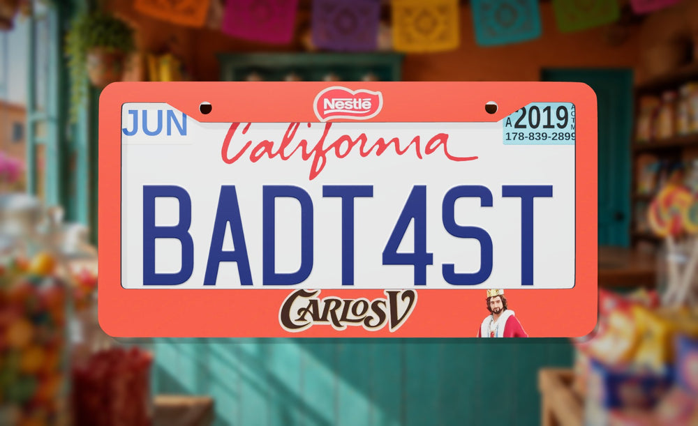 CarlosV license plate frame on a themed background