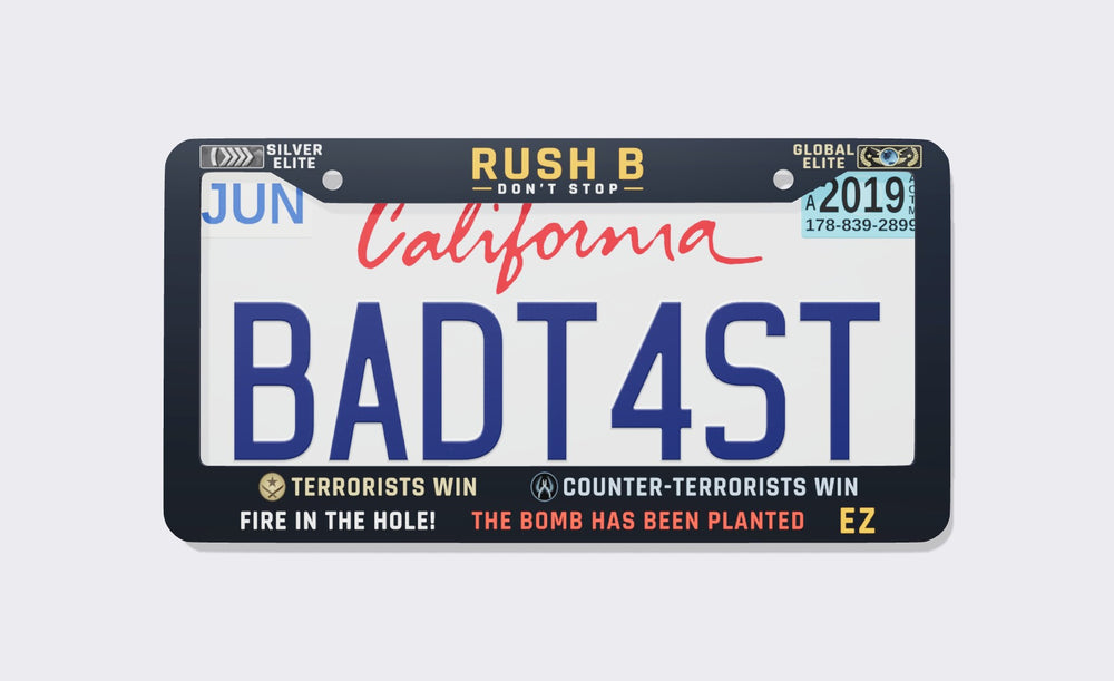 Navy CS:GO memes license plate frame reading Rush B Don't Stop between Silver Elite and Global Elite badges, with Terrorists Win, Counter-Terrorists Win, Fire in the Hole, The Bomb Has Been Planted and EZ on the bottom, front view