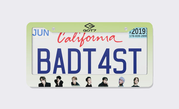 GOT7 license plate frame front view: lime-to-white gradient frame with the black GOT7 logo on top and seven member portraits along the bottom, shown on a California plate