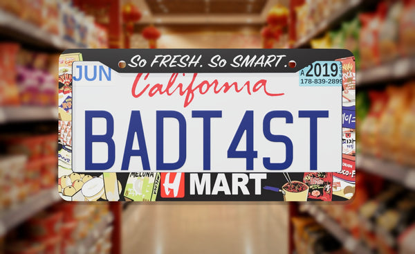H Mart Supermarket license plate frame on a themed background