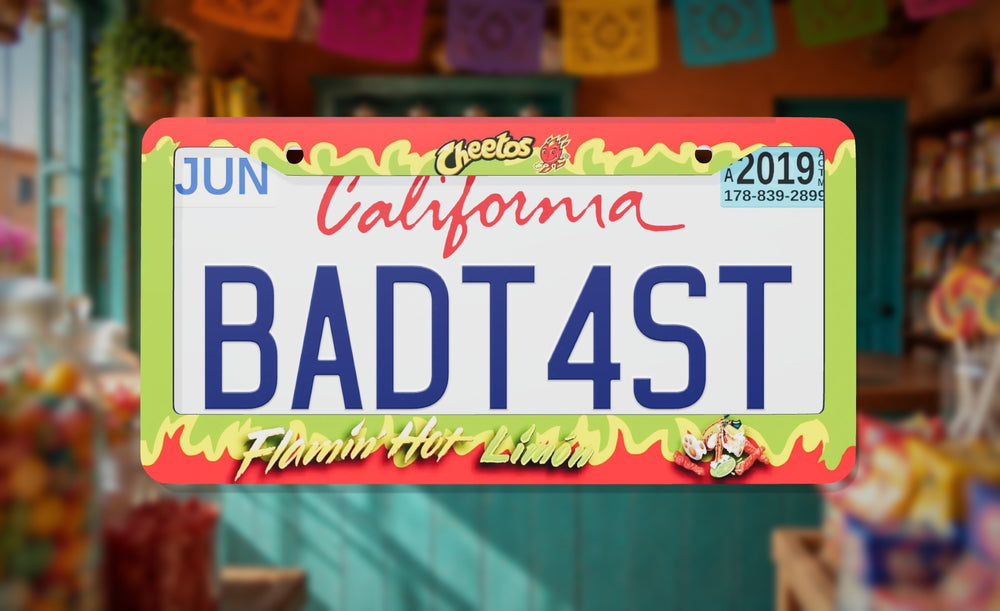 Hot Cheetos Limon license plate frame on a themed background