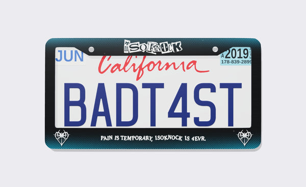 ISOKNOCK license plate frame: the ISOKNOCK logo on black with a teal glow, chrome NITEHARTS hearts in the bottom corners