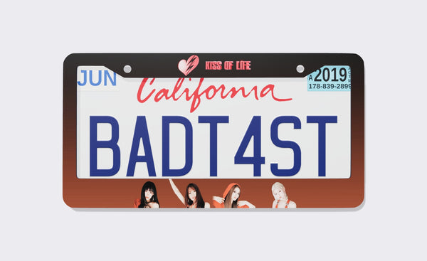 Black-to-orange gradient KISS OF LIFE license plate frame with the red heart logo on top and four members along the bottom