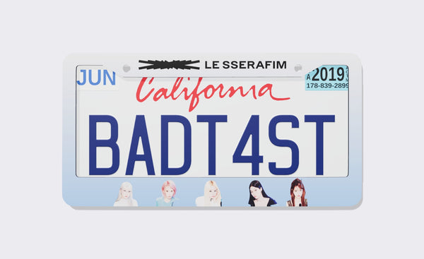 White and pale blue LE SSERAFIM license plate frame with the black logo on top and five members along the bottom
