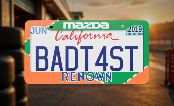 Mazda Renown Racing license plate frame on a themed background
