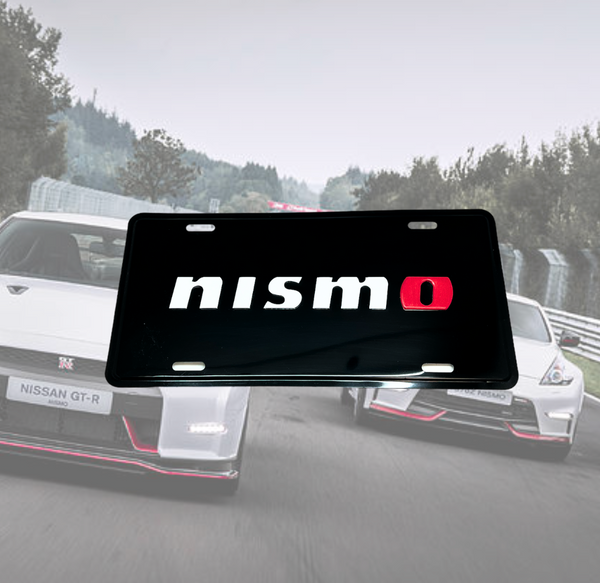 Black Nismo Nissan license plate with white and red logo