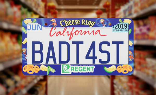 Regent Cheese Ring license plate frame on a themed background