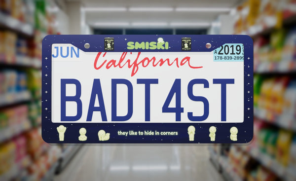 Smiski license plate frame on a themed background