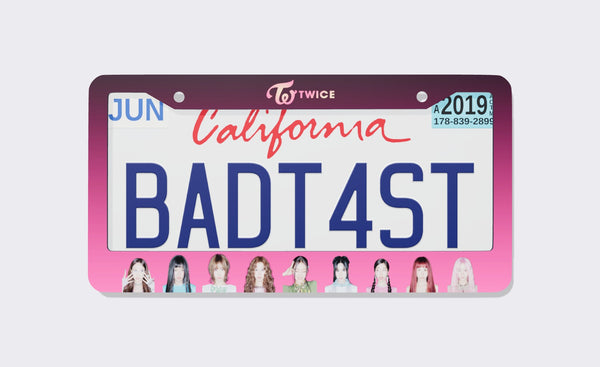 TWICE license plate frame, 2026 edition, front view: plum-to-pink gradient frame with the TWICE logo on top and member portraits along the bottom, shown on a California plate
