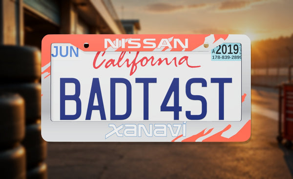 Xanavi Nissan license plate frame on a themed background