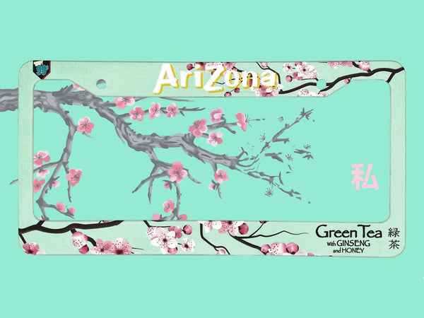 Mint green Arizona Green Tea license plate frame with cherry blossom branch artwork