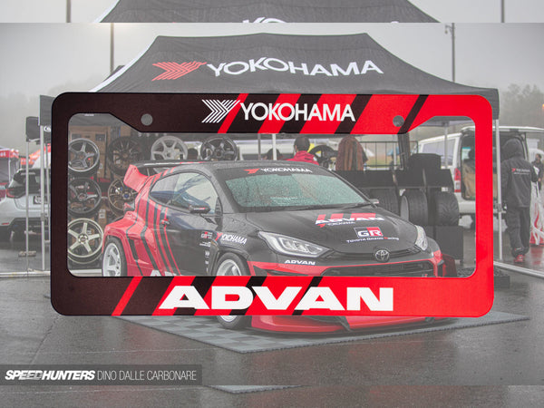 Black and red Advan Racing license plate frame with Yokohama branding and a race car