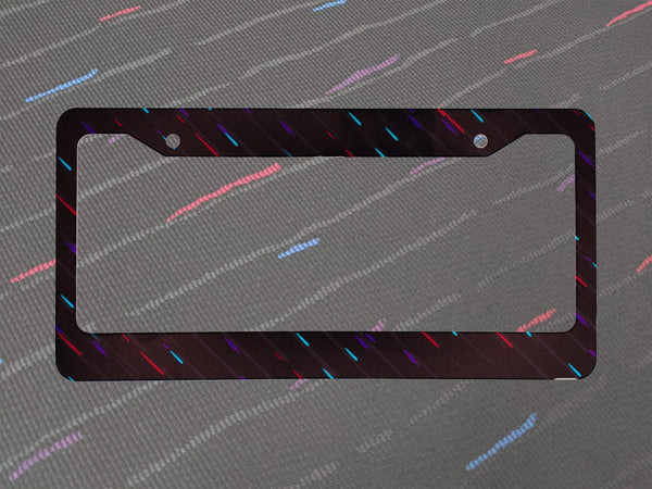 Black M-Rain racing license plate frame with pink and blue confetti dash pattern
