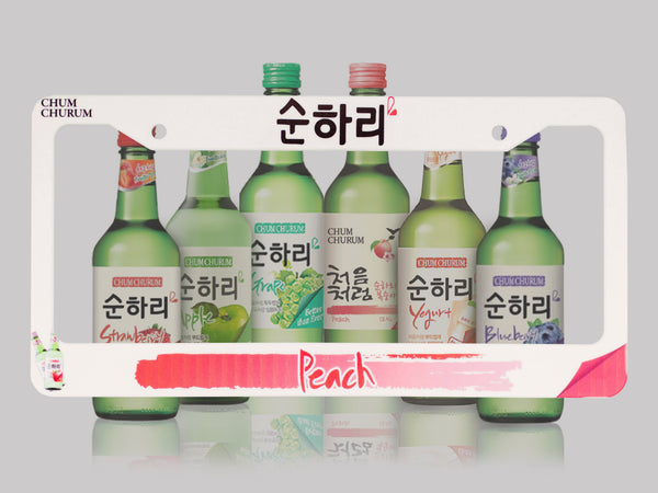 White Chum Churum Peach soju license plate frame with bottle lineup and pink brush text