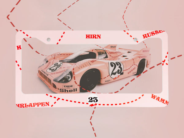 Pink Pig Porsche 917 license plate frame with butcher chart lines and a number 23 race car