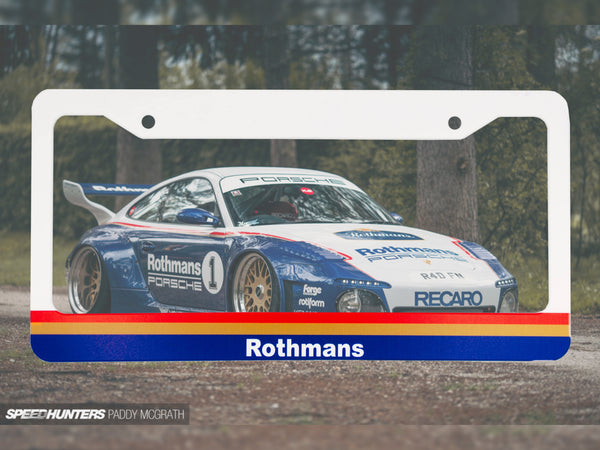 White Rothmans Porsche racing license plate frame with a blue and white race car